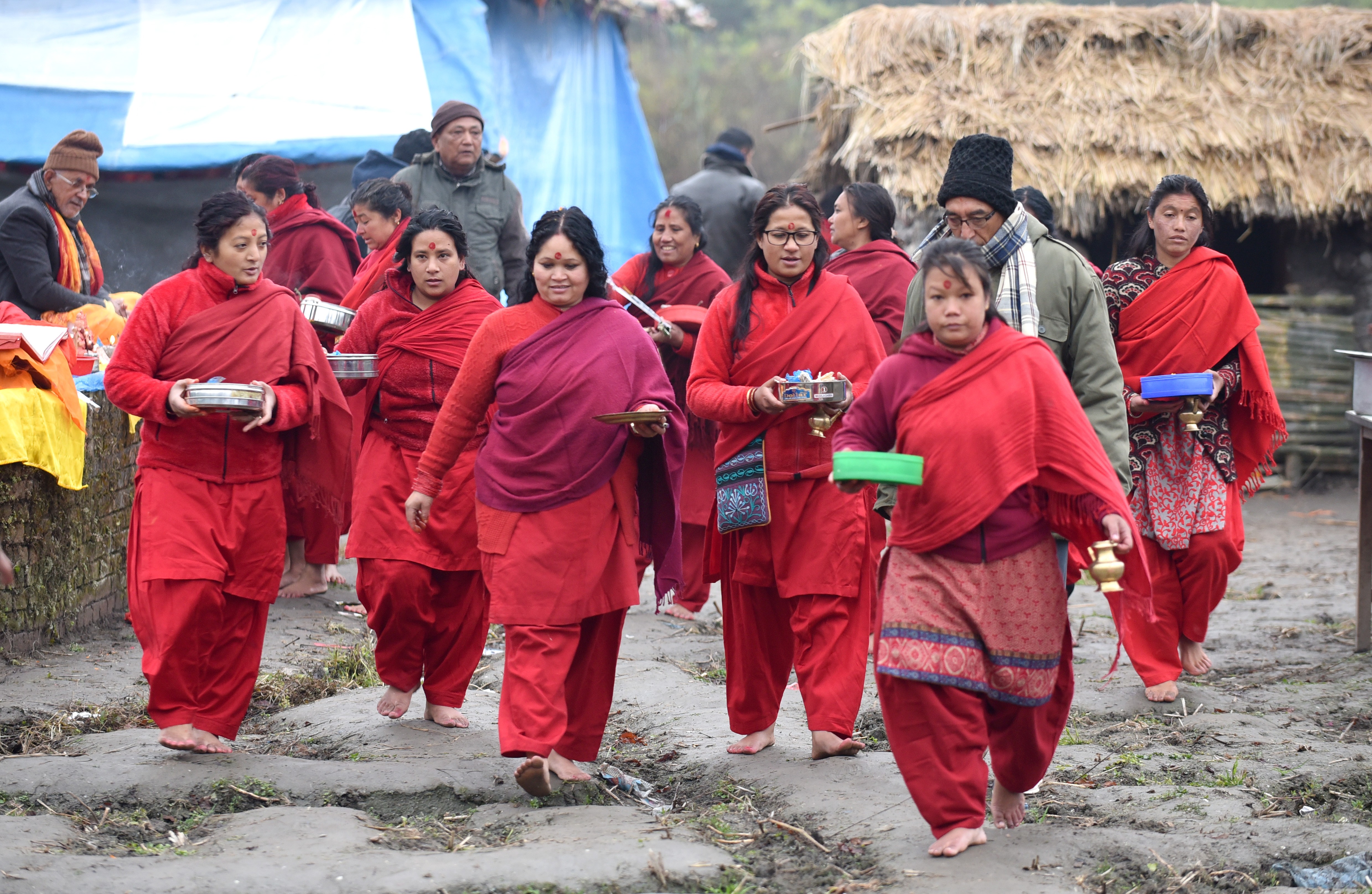 devotees-walk-barefoot-around-the-shrines-in-shankhu-on-the-first-day-of-month-long-swasthani-fasting-sankhu-kathmandu